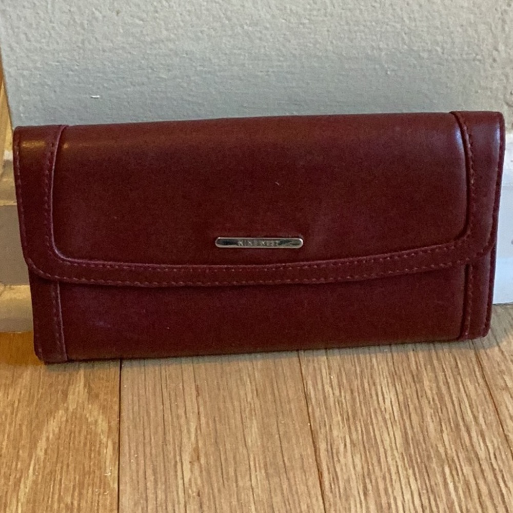 Nine West trifold wallet burgundy real leather.  Multiple card slots. Guc